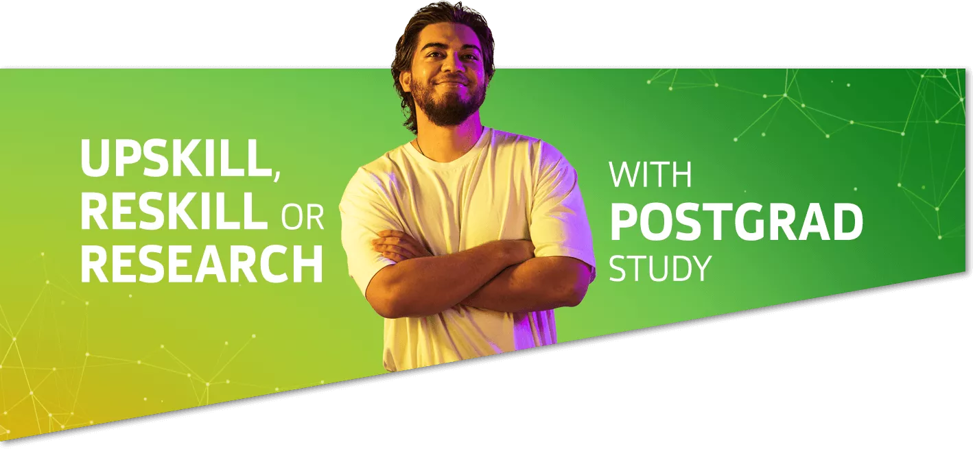 Man standing proud with arms crossed. Upskill, reskill or research with postgraduate study.