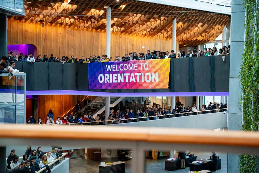 Postgrad-and-International-Mon-15-Feb.jpg AUT welcome to orientation poster at AUT city campus WG building surrounded by eager students