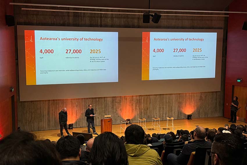 Numbers and slides are presented to the fascinated audience
