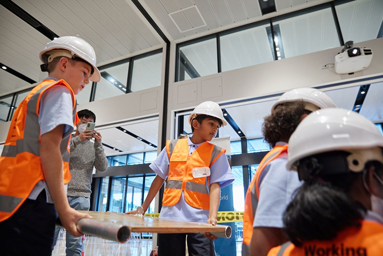 Students constructing a bridge