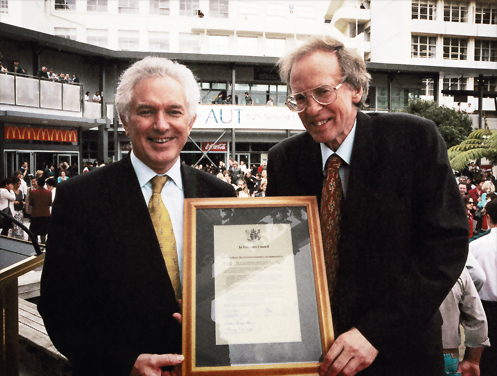 1999 — Tertiary Education Minister Max Bradford (left) and AIT President Dr John Hinchcliff at the announcementthat the institution would become a university from 1 January 2000.