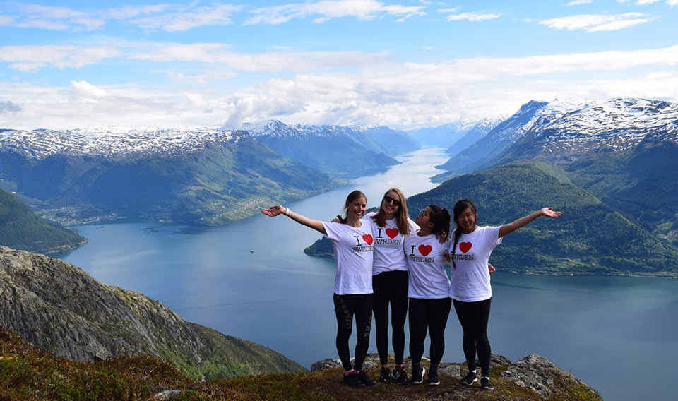 Group of happy people on mountain