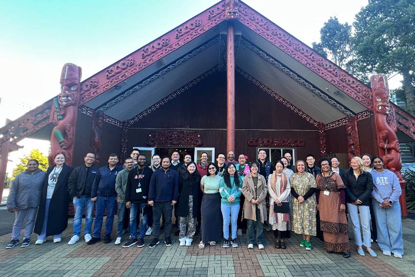 Group photo in front of Ngā Wai o Horotiu Marae