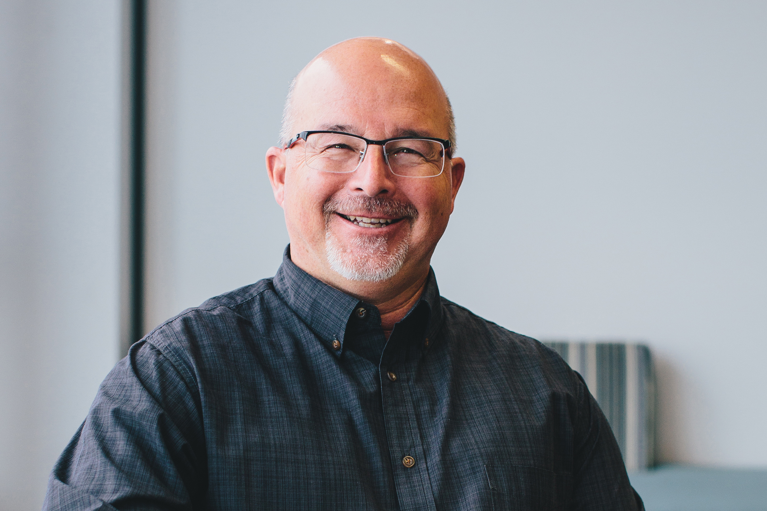 Professor Tim Maloney smiling and looking at the camera