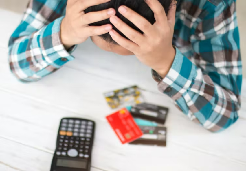 Messy desk with credit cards