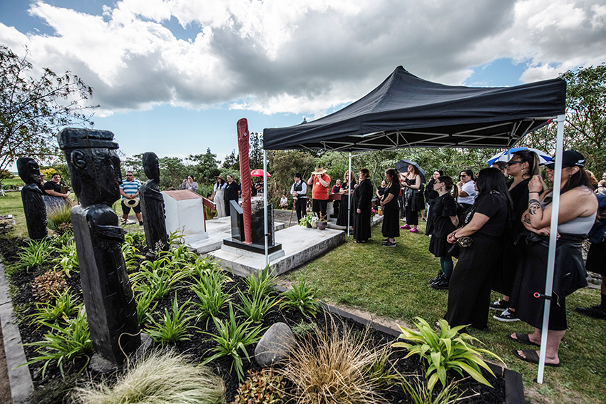 Whānau gather at Kenana urupā for the unveiling of the pou at the experimental urupā tautaiao.