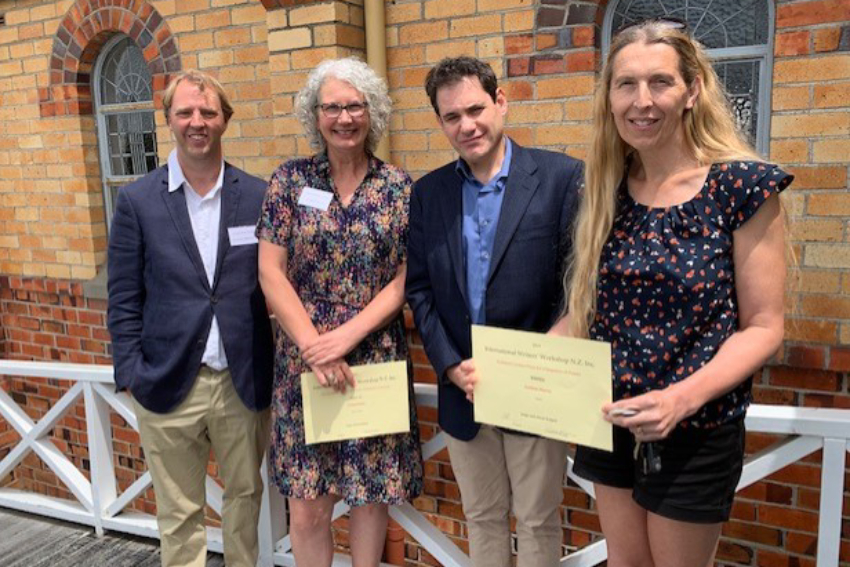 Four people standing in a row at the International Writers Workshop awards ceremony, from left: Duncan Perkinson, Gillian Roach, Siobhan Harvey, and Bryan Walpert.