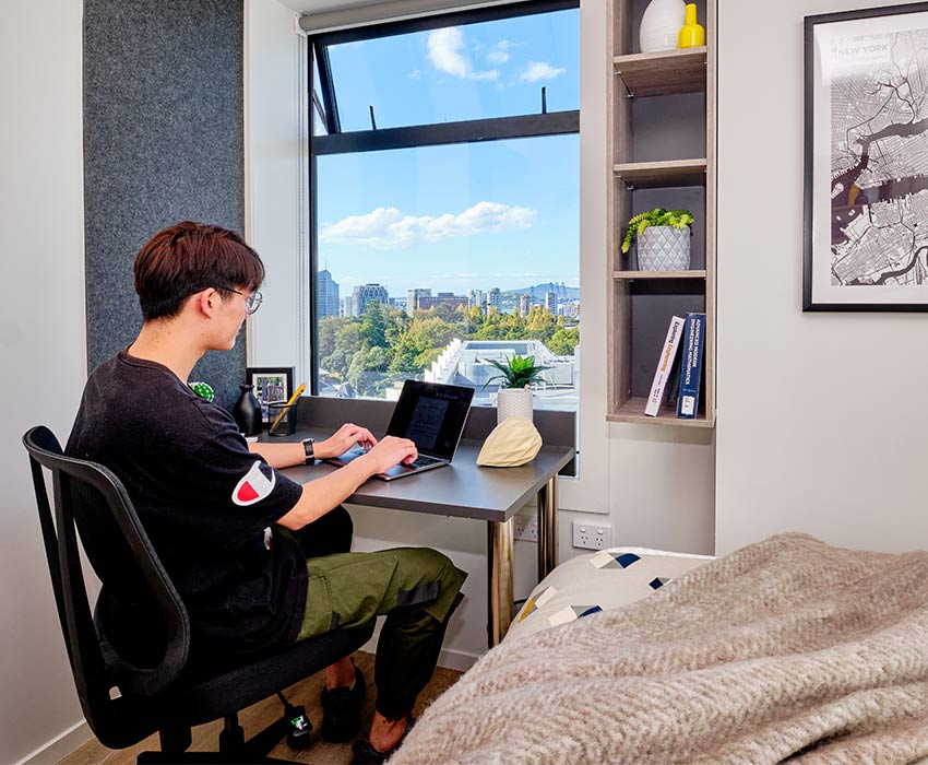 Person studying at office with fantastic view of Auckland city and AUT