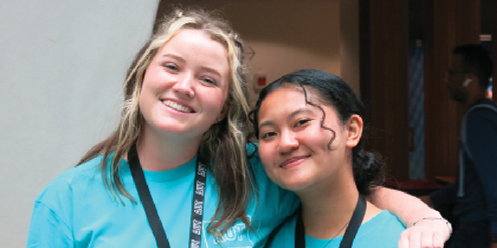 Two student supports smiling at AUT