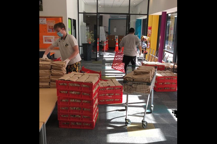 Staff preparing to deliver meals