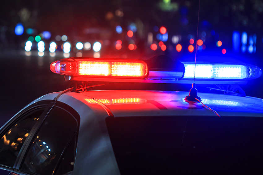 A stock image showing a police car's flashing lights.