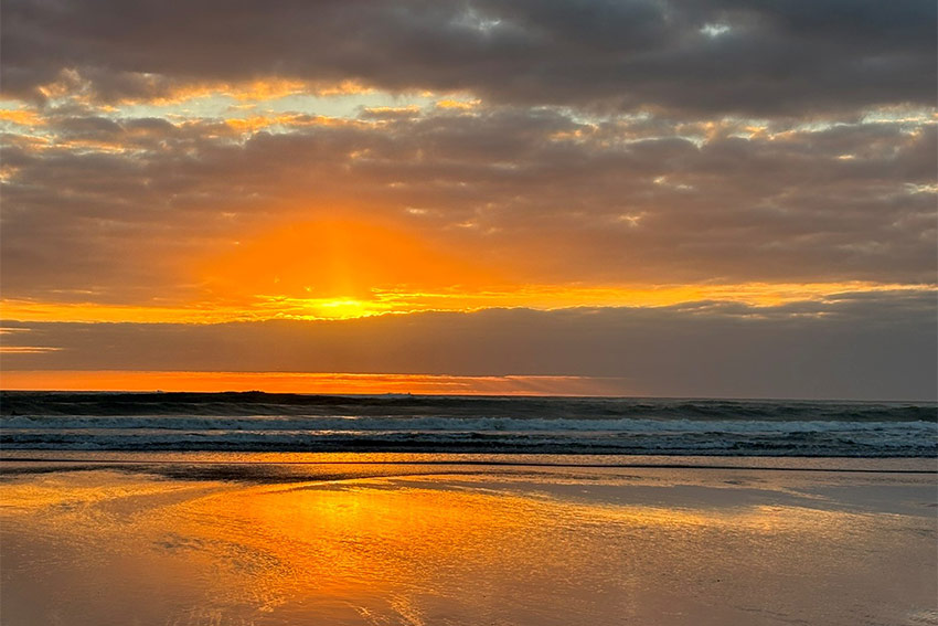 An orange sunset on the beach