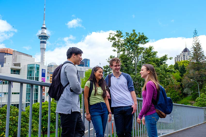 Students in Auckland City, Skytower in background
