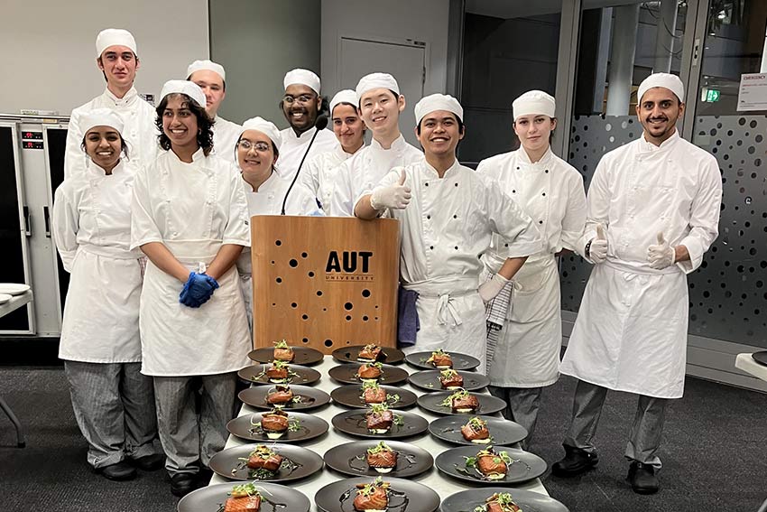 Students in front of plated food