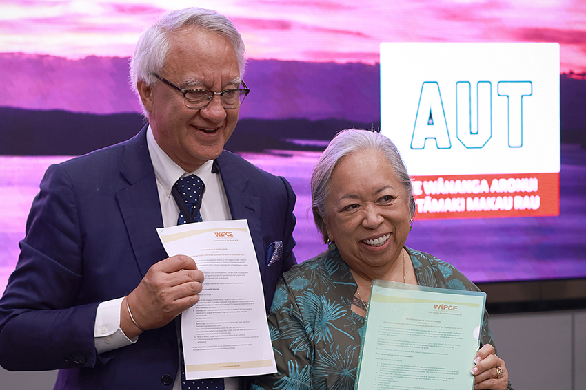 Pare Keiha and Noe Noe Wong-Wilson hold the MOU after both signing it at the event
