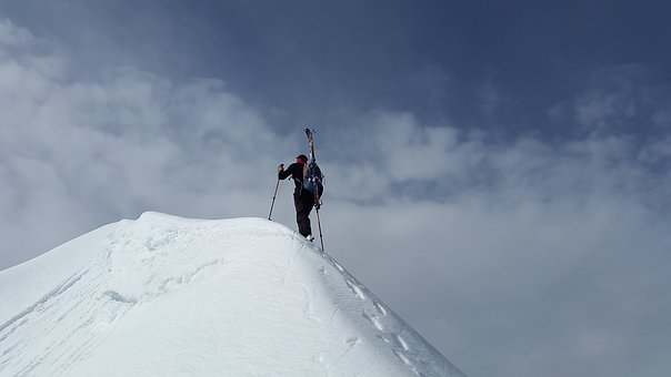 Person climbing mountain