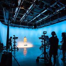 Students in TV studio recording room