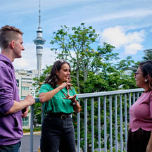 3 people having a conversation using sign language