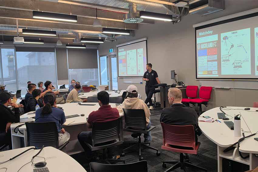 Carl Edwards presenting the seminar on How the role of an analyst in football can provide key insights to coaches to assist with decision making
