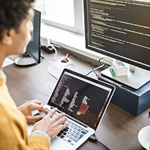 Student at computer programming code