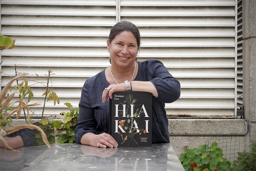 Associate Professor Tracy Berno with the book Hiakai.