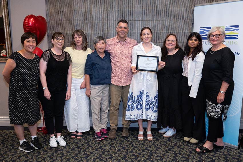 Student medical team standing in group photo