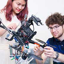 Students with robotic drone