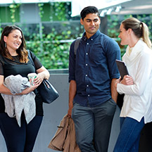 Postgraduate students having a conversation