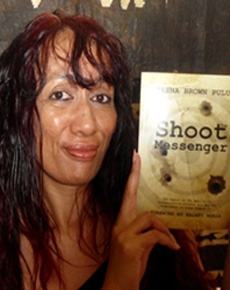 Dr Teena Brown Pulu with her first book, Shoot the Messenger